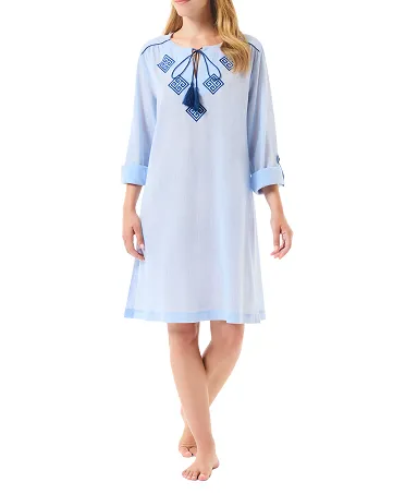 Woman wearing embroidered open collar long sleeve summer short dress