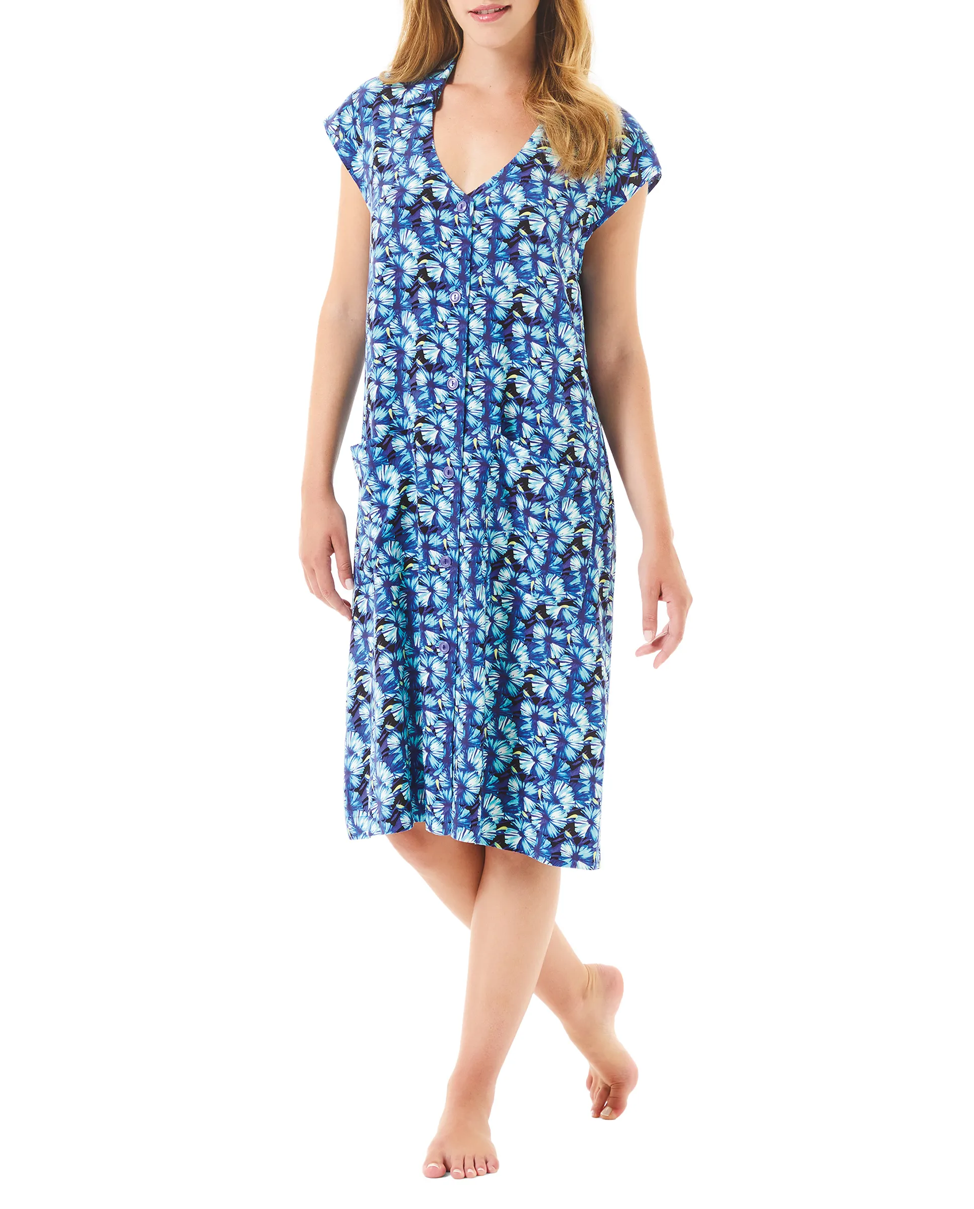 Woman in open blue beach dress with buttons