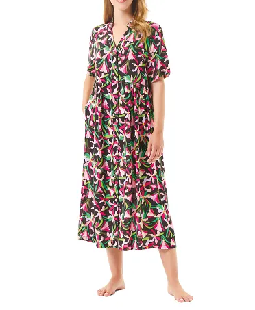 Woman in a long floral summer dress with open button fastening