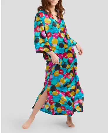 Woman with long summer kaftan in natural printed silk