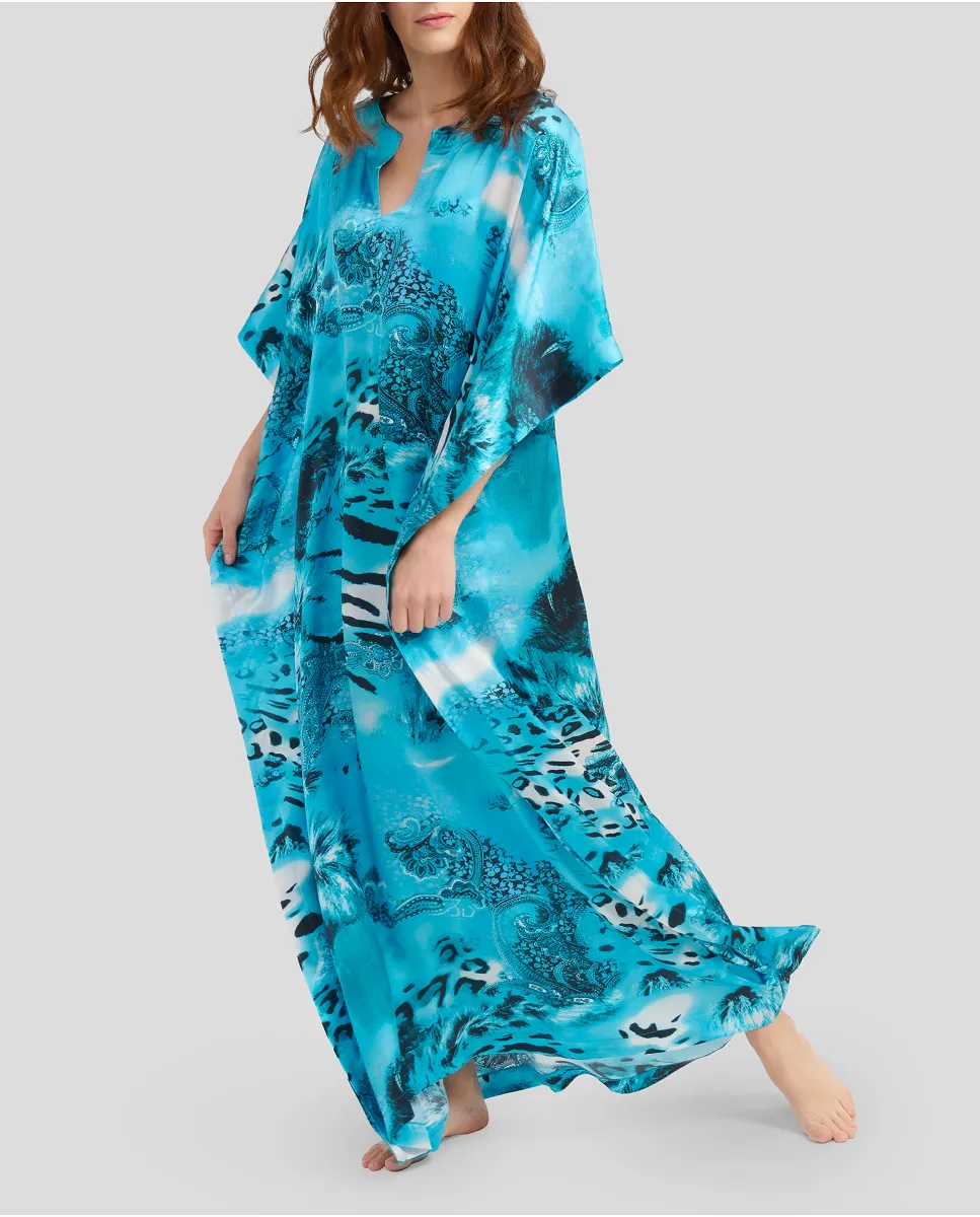 Woman in blue natural silk summer kaftan