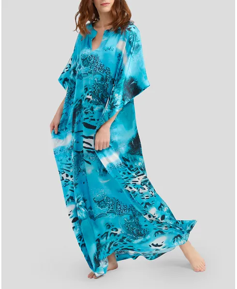 Woman in blue natural silk summer kaftan