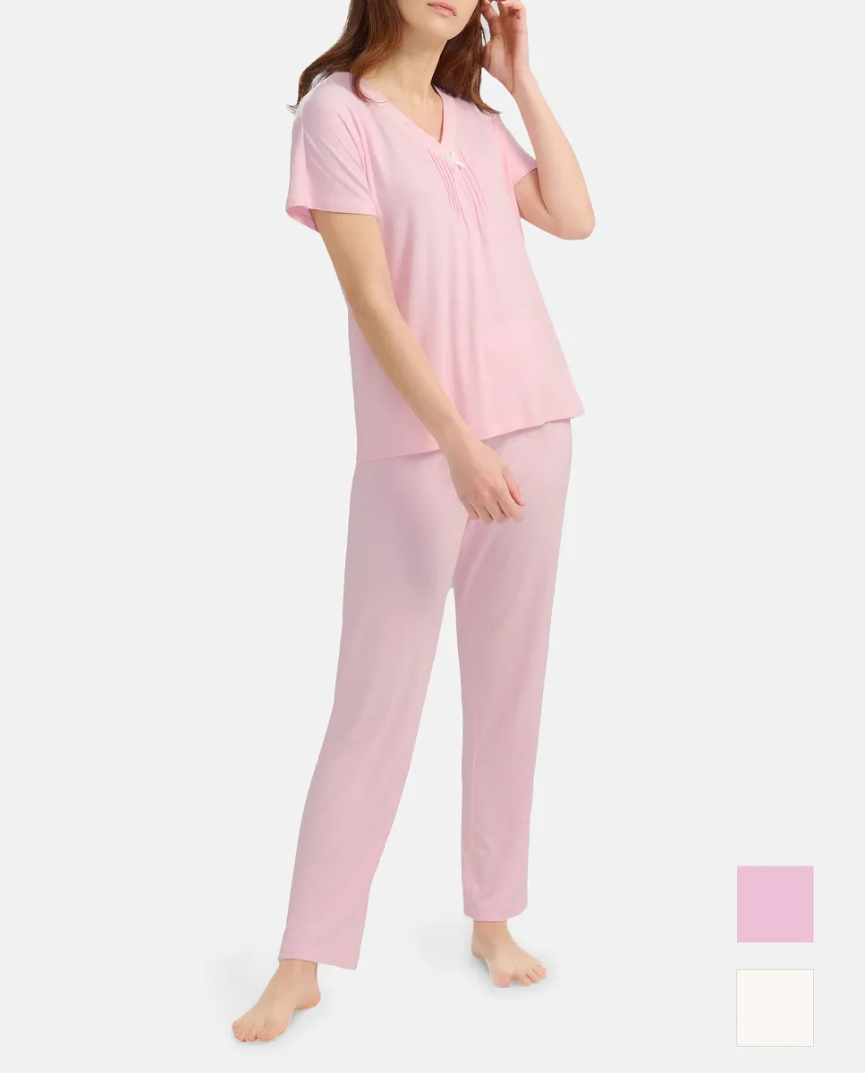 Model with pink summer long pajamas with decorative lace collar