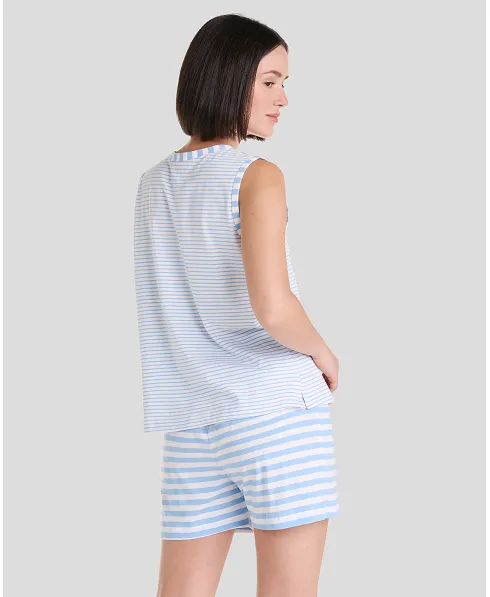 Woman in cool summer sleeveless pyjamas with light blue and white stripes