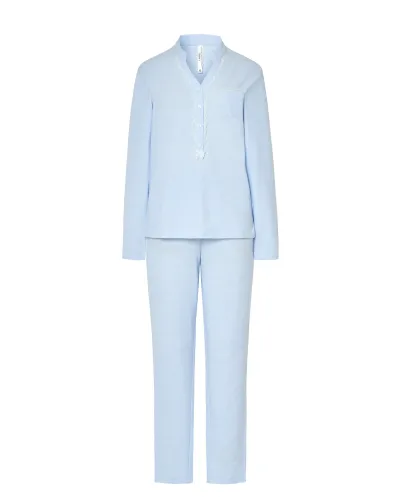 Woman wearing light blue long nightdress pyjamas with an open neckline, lace trim and bow