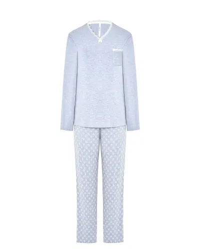 Woman wearing steel blue long-sleeved winter pyjamas with leaf-print trousers