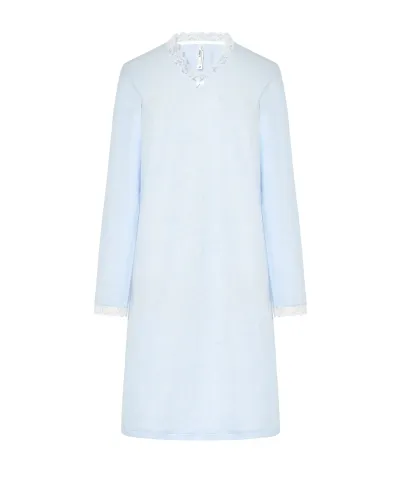 Woman wearing a classic long-sleeved sky blue chemise nightdress with a V-neckline and lace trim.