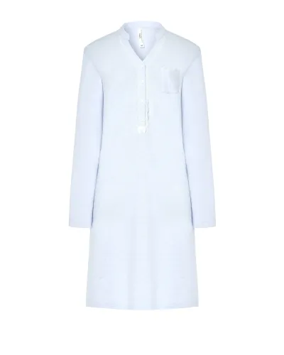 Woman wears a sky blue winter nightdress with a button-down collar and lace and bow details.