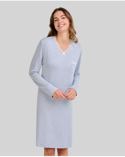 Woman wearing a steel blue long-sleeved nightdress, V-neck detail with lace, bow and pocket