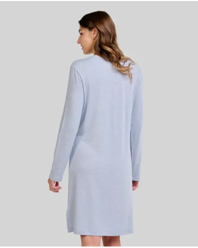 Woman wearing a steel blue long-sleeved nightdress, V-neck detail with lace, bow and pocket