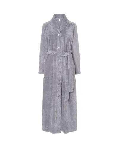 Woman wearing a long grey jacquard robe with buttons, belt and side pockets