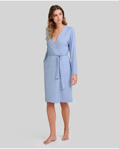 Woman wearing a long double-breasted dressing gown in elegant steel blue modal fabric