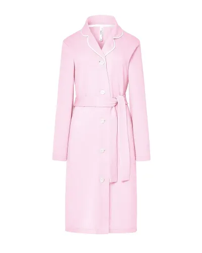 Woman wearing an elegant long pink lingerie robe with buttons and a belt