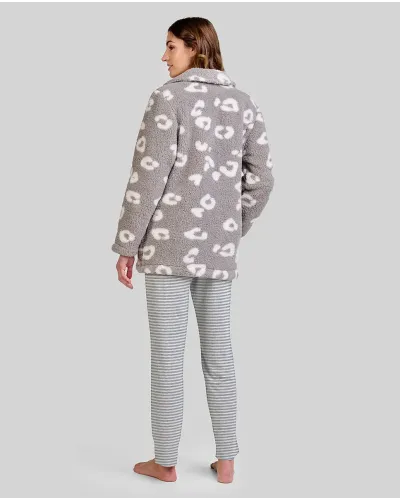 Woman wears grey striped winter pyjamas and matching printed dressing gown