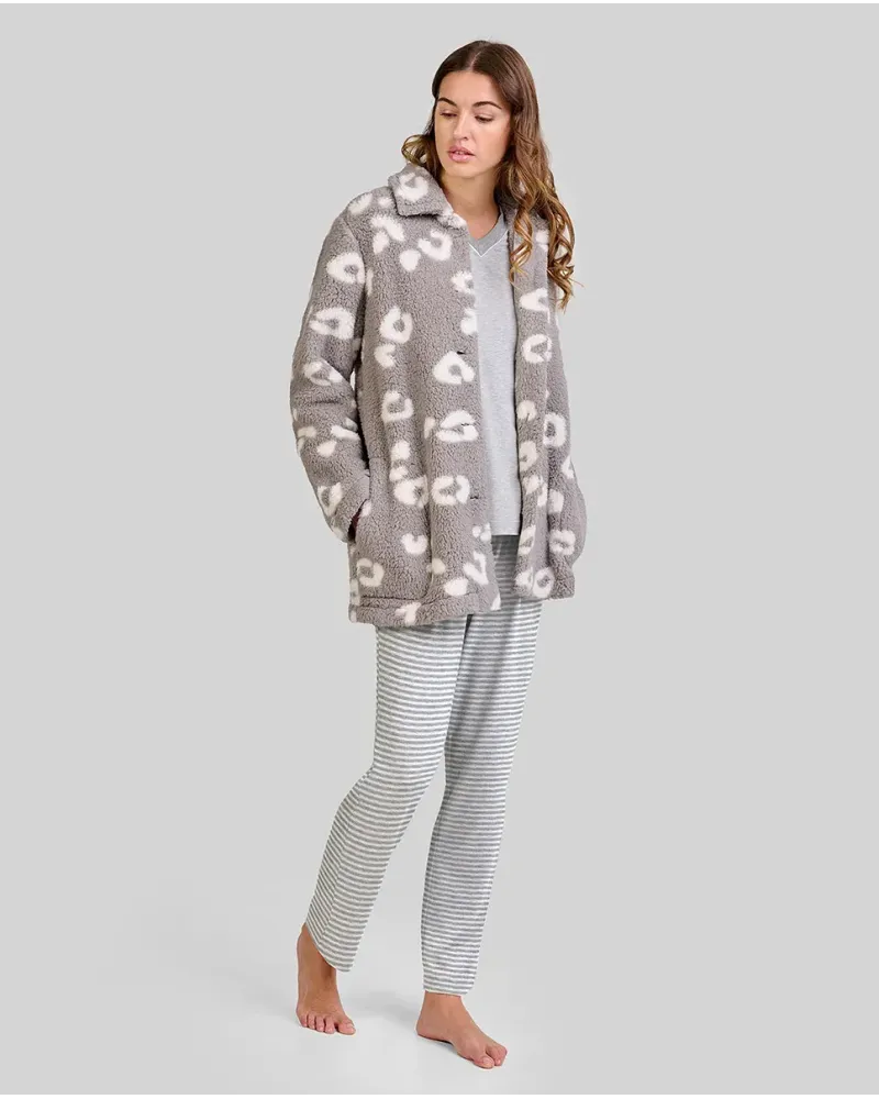 Woman wears grey striped winter pyjamas and matching printed dressing gown