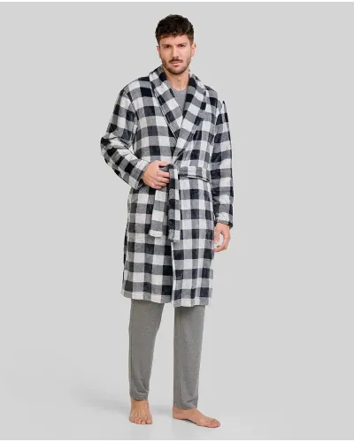 Man wearing a warm grey checked winter dressing gown with grey pyjamas and T-shirt