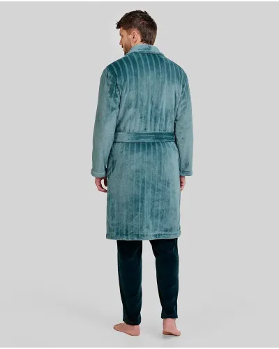 Man wearing a long jacquard robe with green stripes, tuxedo collar, side pockets and belt