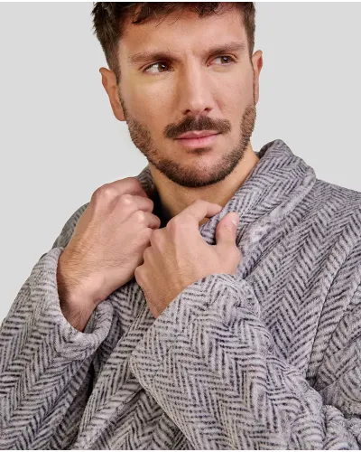 Man wearing a grey double-breasted dressing gown with side pockets
