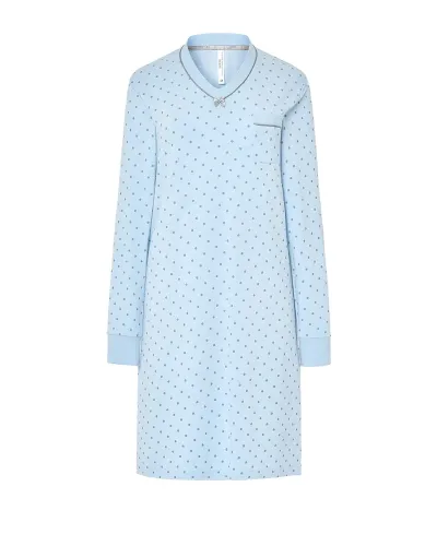 Woman wearing a light blue long-sleeved nightdress with a small polka dot pattern and pocket