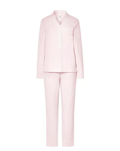 Woman wearing pale pink long nightdress pyjamas with open neckline, lace trim and bow