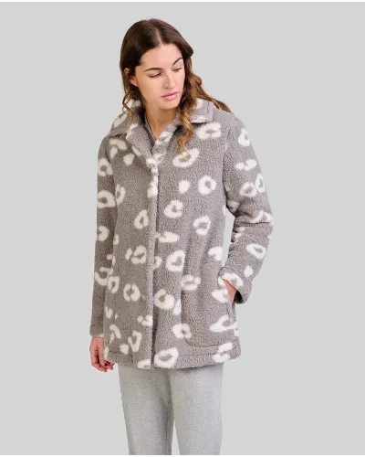 Woman wears short grey button-up robe with animal print over grey pyjamas