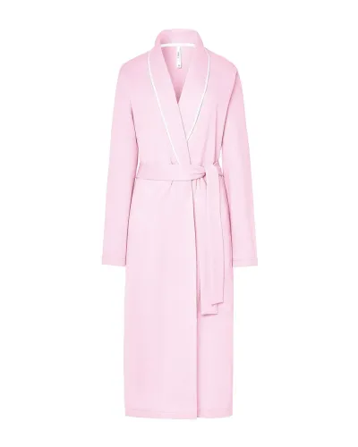 Woman wearing a long sky blue lace-up dressing gown with a tuxedo collar and piping