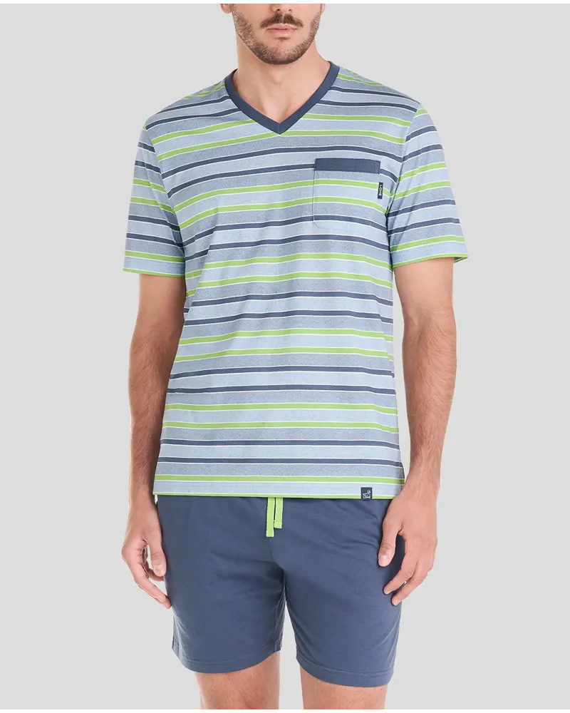 Man wears short striped summer pyjama top and blue shorts.