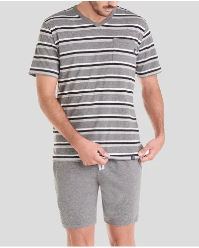 Man wears short grey striped pyjama shorts perfect for summer