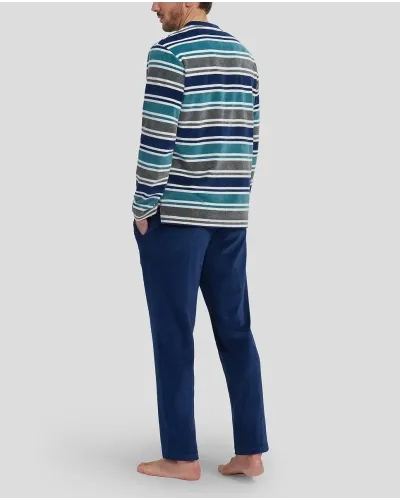 Man with long winter pyjamas in navy and green striped velvet