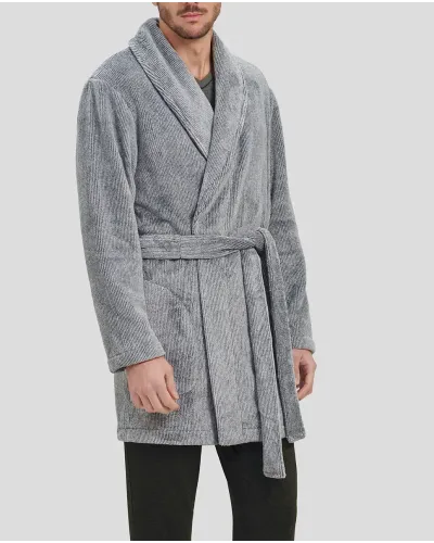 Man in a short grey winter coat with a cross waist belt and pockets