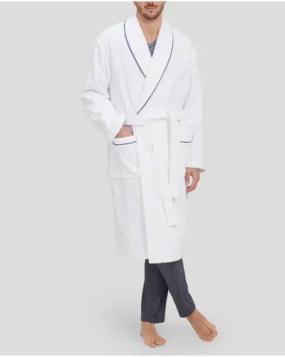 Man in white bathrobe with dinner jacket collar and blue piping and pockets