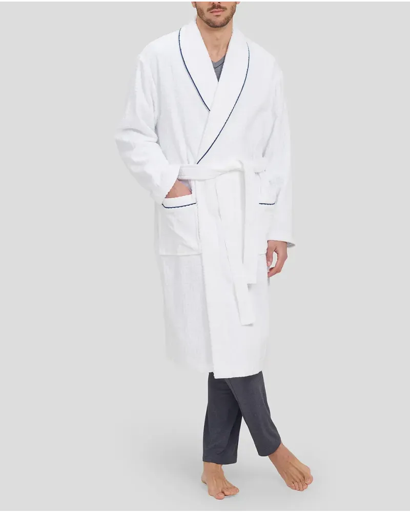 Man in white bathrobe with dinner jacket collar and blue piping and pockets