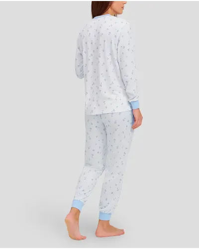woman with long winter pyjamas with light blue heart print