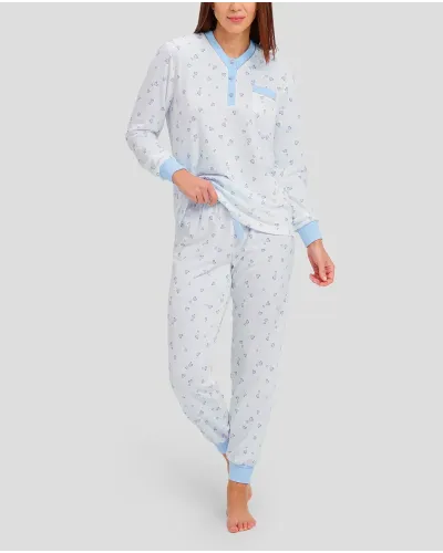 woman with long winter pyjamas with light blue heart print