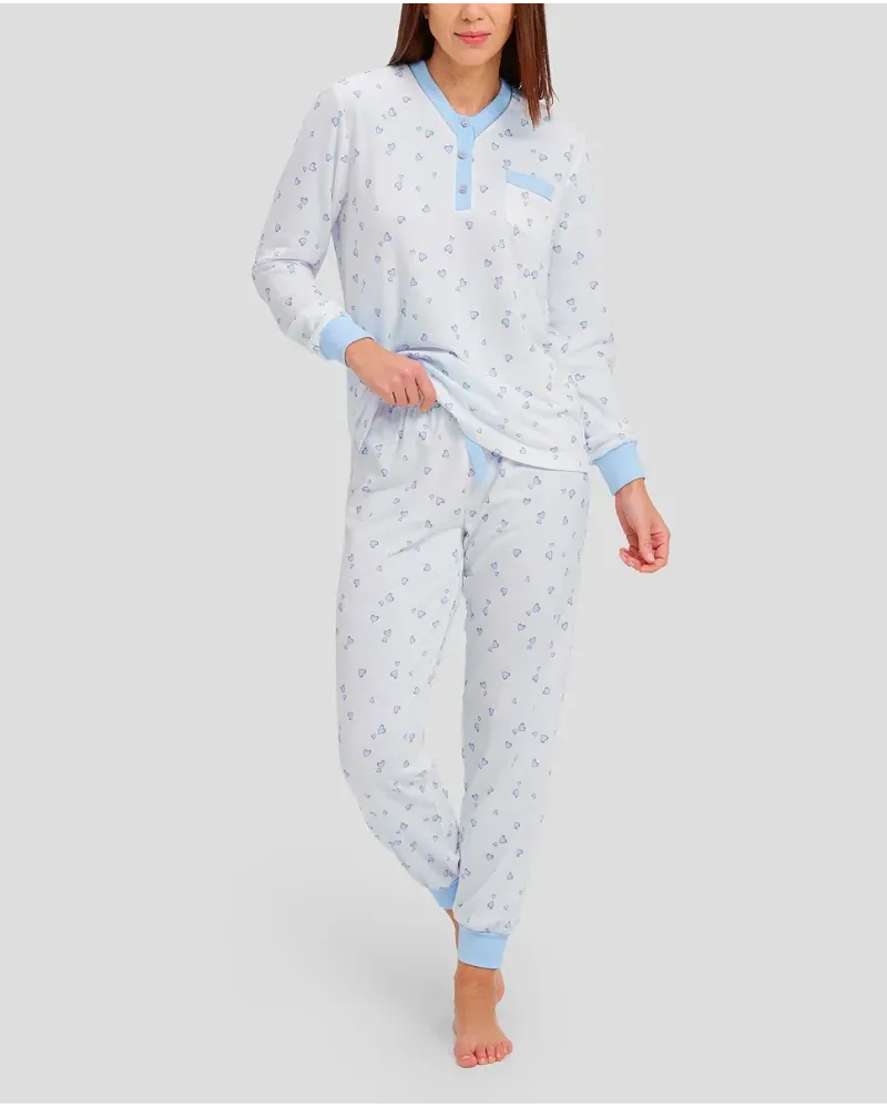 woman with long winter pyjamas with light blue heart print