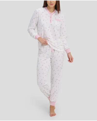 woman with long winter pyjamas with pink heart print