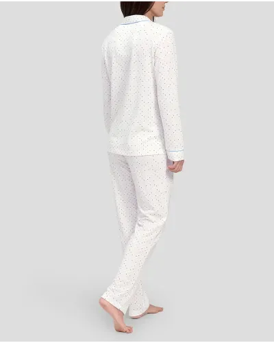 Woman in open shirt pyjamas with long sleeves and light blue heart print