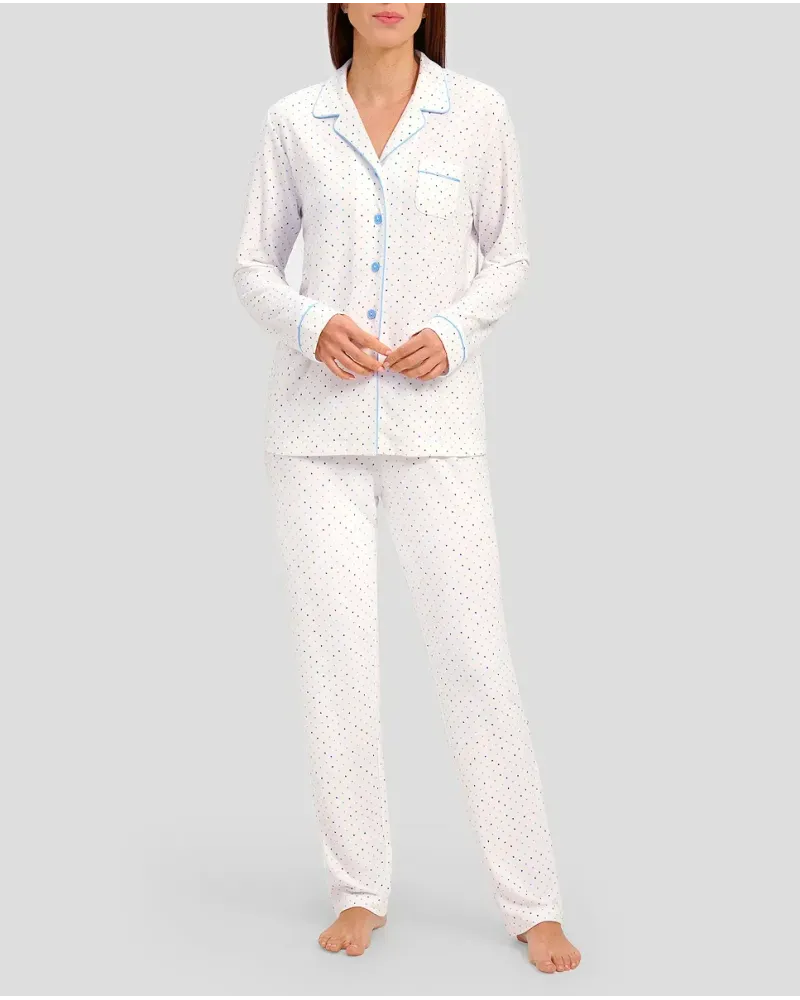 Woman in open shirt pyjamas with long sleeves and light blue heart print