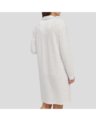 Woman in long buttoned winter nightgown for winter