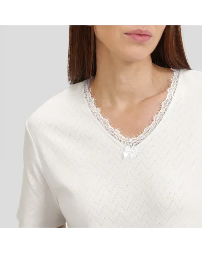 Woman in ivory short sleeve lingerie nightgown