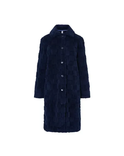Woman in navy checkered jacquard winter long coat