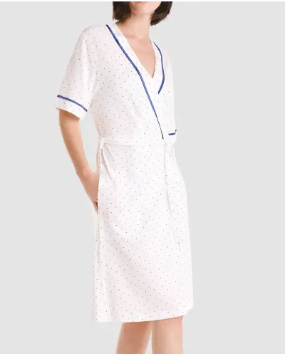 Lightweight, short-sleeved summer coat, double breasted with belt, piped details and side pockets.