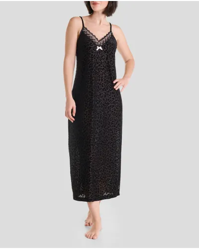 Woman in leopard long nightdress, V-neck with lace, pink bow and thin shoulder straps, matching black velvet dressing gown