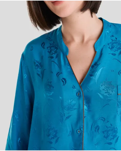 Woman in open long jacquard pyjamas blue
