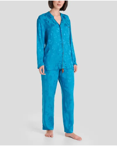 Woman in open long jacquard pyjamas blue