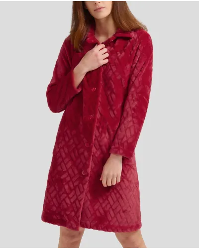 Woman in burgundy long dressing gown with buttons