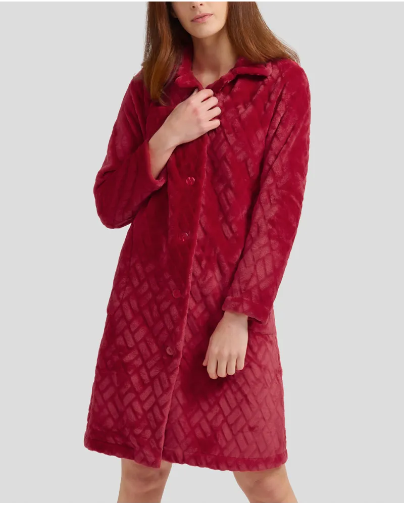 Woman in burgundy long dressing gown with buttons