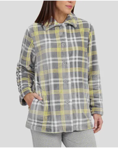 Woman in short plaid buttoned winter dressing gown