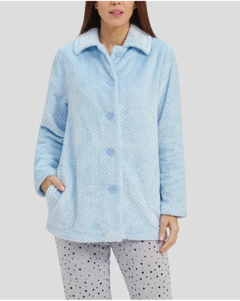 Woman in short light blue buttoned dressing gown with side pockets