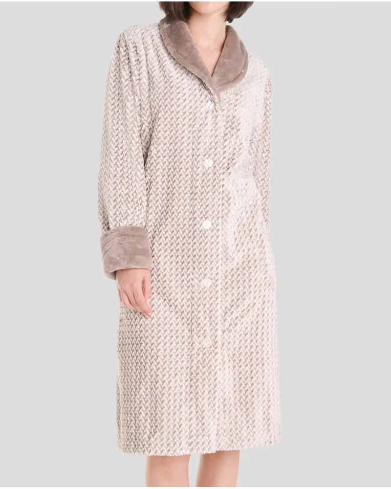 Woman in jacquard long coat with grey herringbone pattern